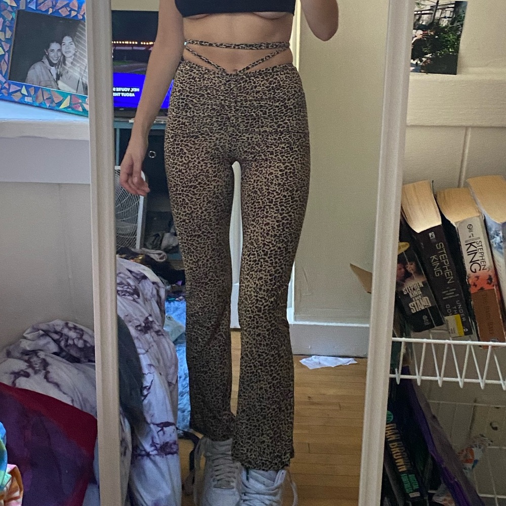MAIN CHARACTER CHEETAH WAIST TIE FLARE PANTS